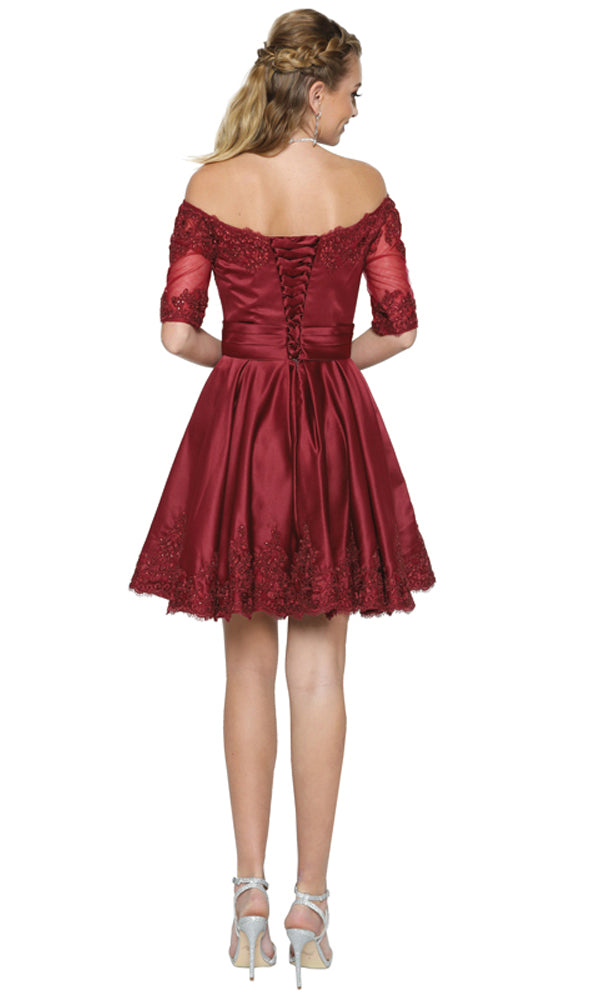 A woman in the Juliet 804 short semi-formal dress, featuring a red, off-the-shoulder design.